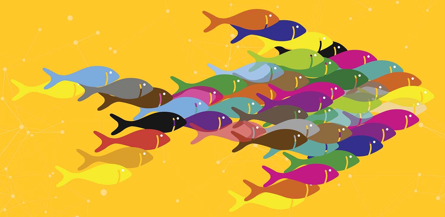Illustration of a group of fish swimming together in the shape of one big fish