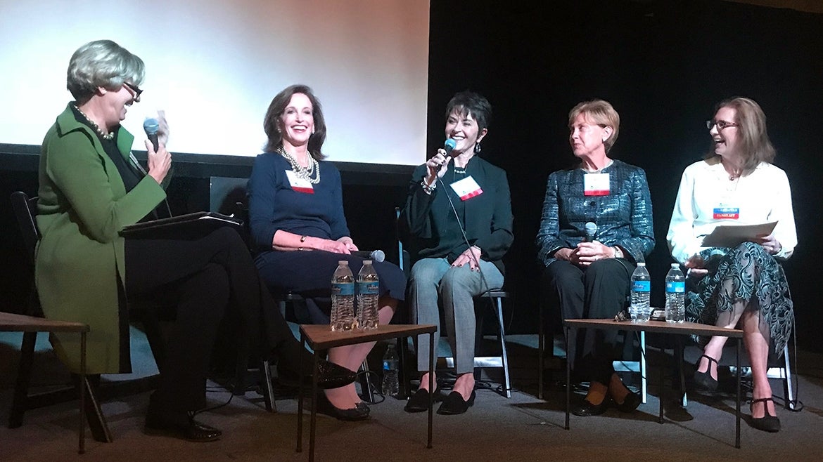 5 people converse sit on chairs on a stage: Debra Mesch, Amy Gibbons, Juanita F. Francis, Jackie Norton, and Cindy Watts.