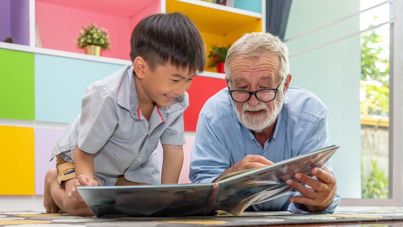 Volunteer reading to a child